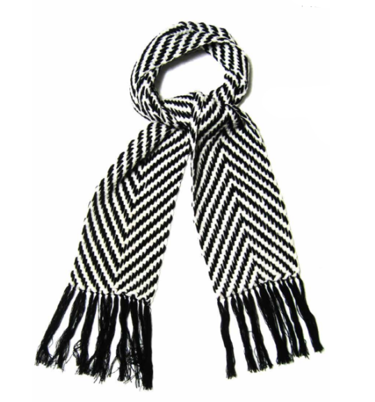 Knitted scarf with geometric patterns, crafted from soft alpaca, bamboo, and silk.