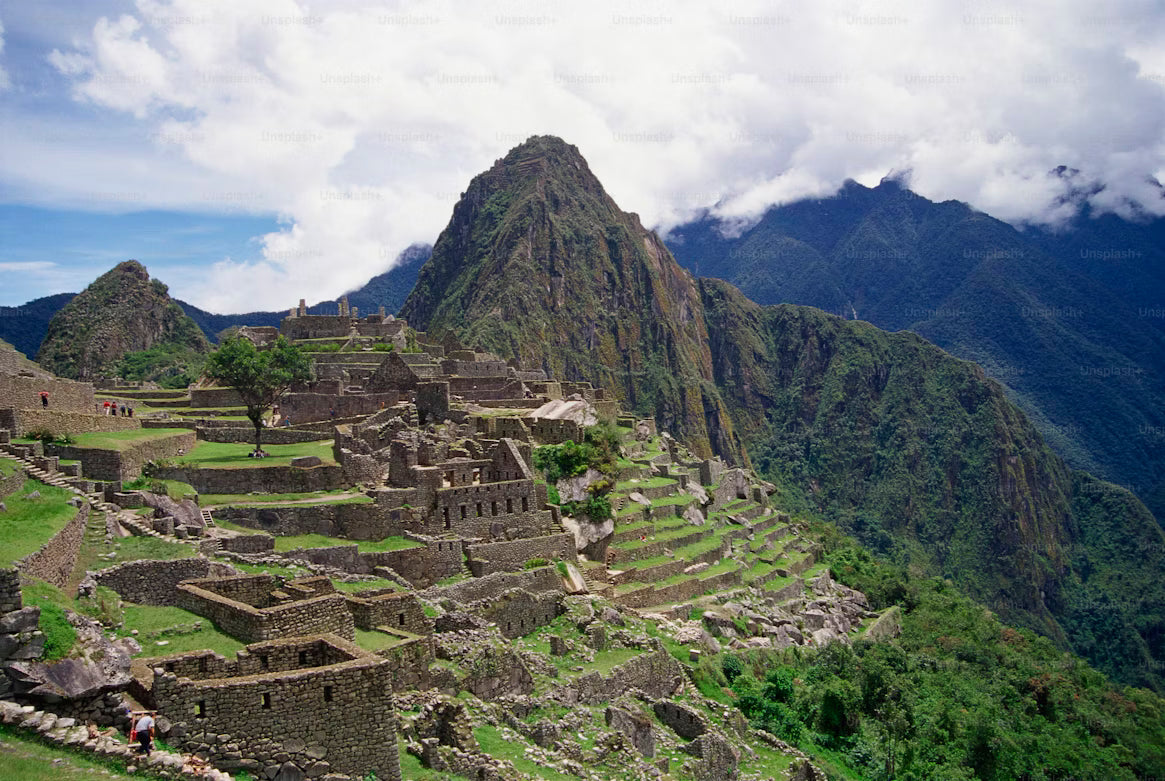 Machu Picchu with terraced buildings and mountainous landscape
