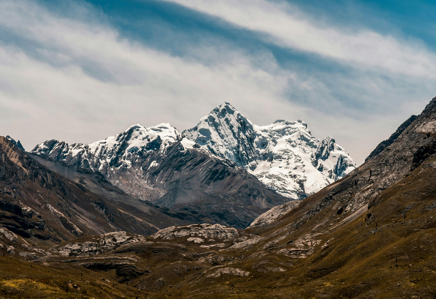Snow-capped mountain peaks with a clear sky